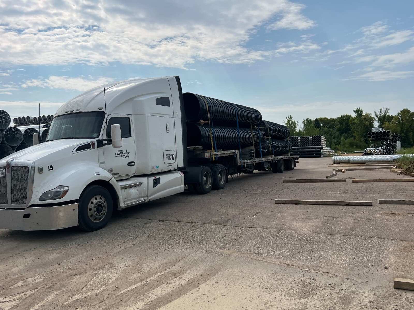 Unit 19 hauling corrugated pipe