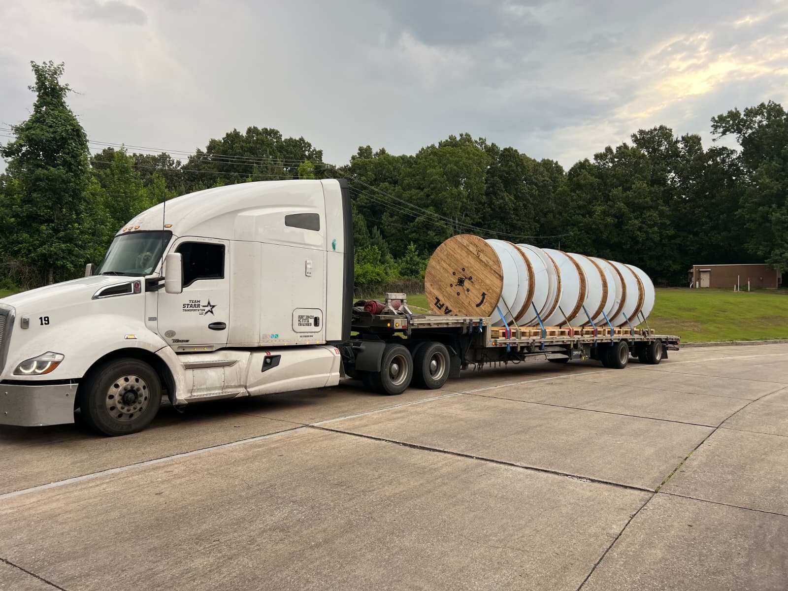 Flatbed loaded with cable reels